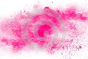 Abstract pink dust explosion on white background.