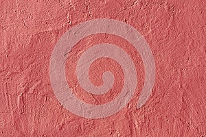 Abstract pink plaster wall texture.