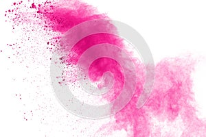 Abstract pink powder splatted background,Freeze motion of color powder exploding/throwing color powder,color glitter texture on wh