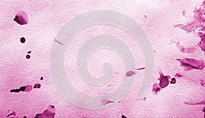 Abstract pink watercolor splashes on white and pink paper texture as background design