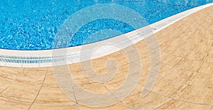 Abstract Pool with blue water background. Top view of swimming pool and floor texture. Panorama of pool bottom with tile