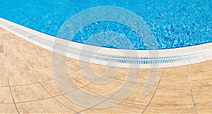 Abstract Pool with blue water background. Top view of swimming pool and floor texture. Panorama of pool bottom with tile
