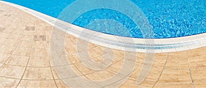 Abstract Pool with blue water background. Top view of swimming pool and floor texture. Panorama of pool bottom with tile