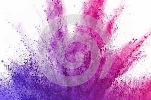 Abstract powder splatted background. Colorful powder explosion on white background. Colored cloud. Colorful dust explode. Paint Ho