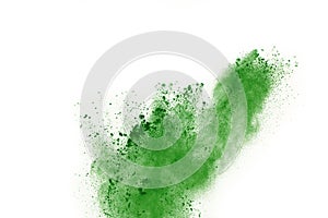 Abstract powder splatted background,Freeze motion of green powder exploding/throwing green dust