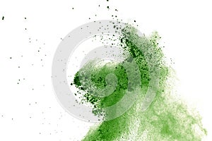 Abstract powder splatted background,Freeze motion of green powder exploding/throwing green dust