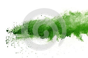 Abstract powder splatted background,Freeze motion of green powder exploding/throwing green dust