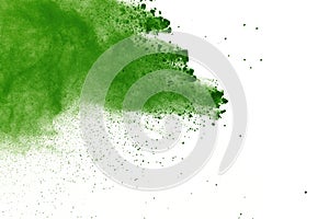 Abstract powder splatted background,Freeze motion of green powder exploding/throwing green dust