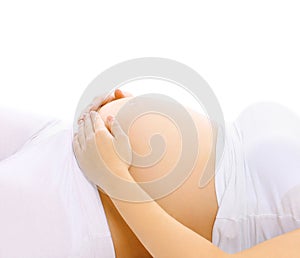 Abstract pregnancy concept - pregnant woman holding belly