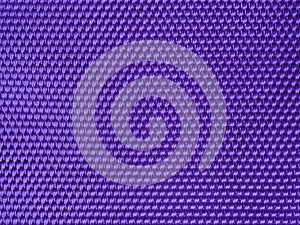 Abstract purple fabric texture blur background with closeup surface and fiber of silk