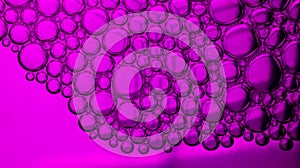 Abstract purple-graded water background and transparent soap bubble pattern