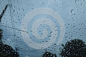 Abstract Rain Drops On Car Windshield Selectable Focus Image For Rainy Season