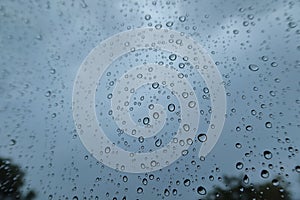 Abstract Rain Drops On Car Windshield Selectable Focus Image For Rainy Season