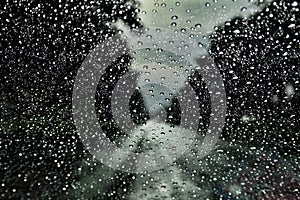 Abstract Rain Drops On Car Windshield Selectable Focus Image For Rainy Season Background