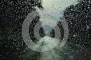 Abstract Rain Drops On Car Windshield Selectable Focus Image For Rainy Season Background