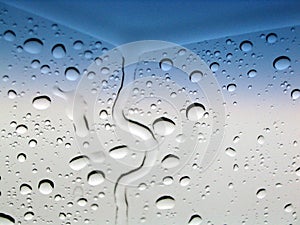 Abstract rain drops on a windshield