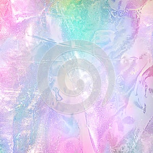 Abstract rainbow holographic foil texture. Trendy magic background with pastel colours photo