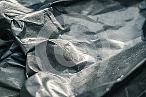 Abstract real paper surface background. Aluminum Platinum Silver foil. Wrinkled crumpled folds bend crush crease kink