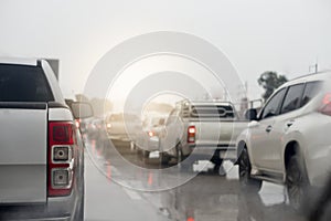 Abstract of rear pickup car. Rear side view of car in rainy time and traffic jam.