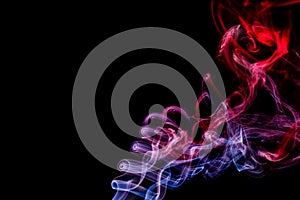 Abstract red - blue smoke from aromatic sticks.
