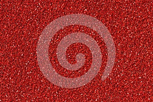 Abstract red Christmas glitter background.