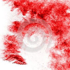 Abstract red dust explosion on white background.