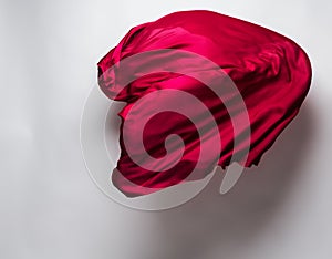 Abstract red fabric in motion