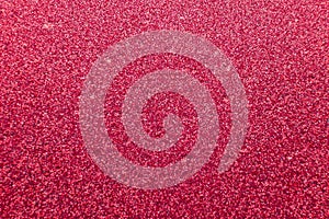 Abstract red glitter background with rough textured