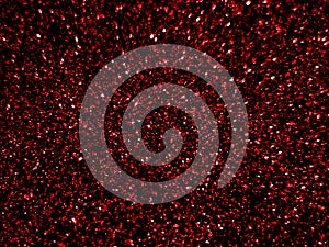 Abstract red glitter light sparkle texture background.