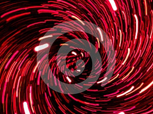 Abstract red light trails swirl