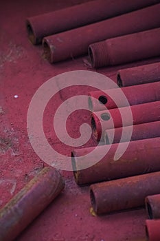 Abstract red metall pipe on the floor