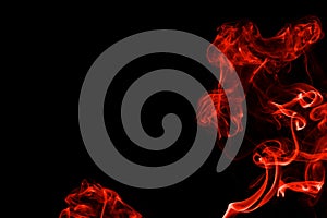 Abstract red orange color smoke isolated on black background. beautiful color smoke wallpaper backdrop