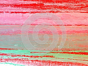 Abstract in red, pink, and green. A close-up view of an abstract artwork featuring a vibrant combination of red, pink, and green