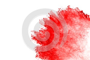 Abstract of red powder explosion on white background. Red powder splatted isolate. Colored cloud. Colored dust explode. Paint Holi