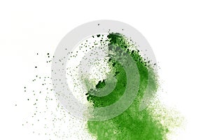 Abstract Red powder splatted background,Freeze motion of red powder exploding/throwing green dust.