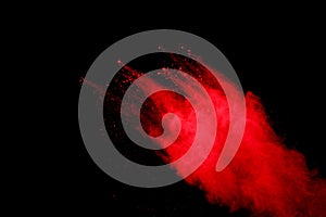 Abstract Red powder splatted background,Freeze motion of red powder exploding/throwing green dust