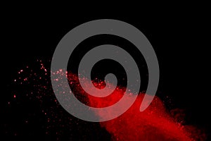 Abstract Red powder splatted background,Freeze motion of red powder exploding/throwing green dust