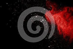 Abstract Red powder splatted background,Freeze motion of red powder exploding/throwing green dust
