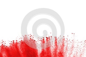 Abstract red powder splatted on white background.