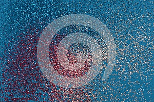 Abstract red, white and blue glitter sparkle background. Holiday concept. Flat lay.