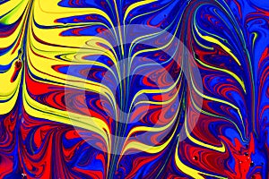 Abstract red, yellow and blue paint swirls