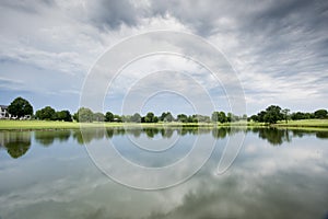 Abstract Reflection in Gold Course Water Hazard