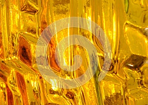 Abstract relief yellow glass