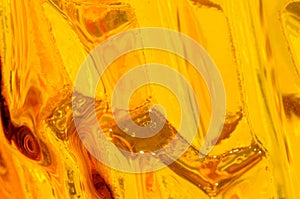 Abstract relief yellow glass
