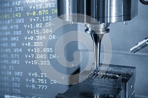 The abstract scene of the G-code data and the CNC milling machine cutting the injection mold parts