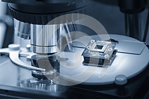 Abstract scene of microscope and the microchip.