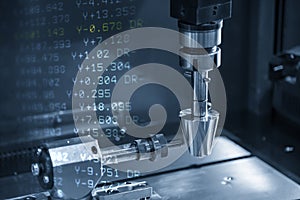 The abstract scene of sinker EDM machine simulate operation with the NC data background.