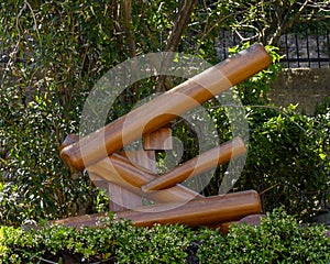 Abstract sculpture of wooden beams and blocks in the Museo del Parco in Portofino, Italy photo