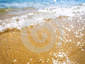 Abstract sea background. Abstract sandy summer beach background with bokeh lights on light blue sky. Beautiful texture. Space