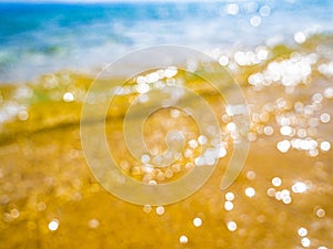 Abstract sea background. Abstract sandy summer beach background with bokeh lights on light blue sky. Beautiful texture. Space